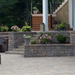 Back patio of a home featuring Shaw Brick's Tumbled WallStone products