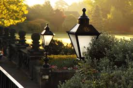 Two outdoor lights in a garden